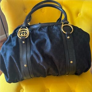 Gucci Black Shoulder Bag with Gold Accents
